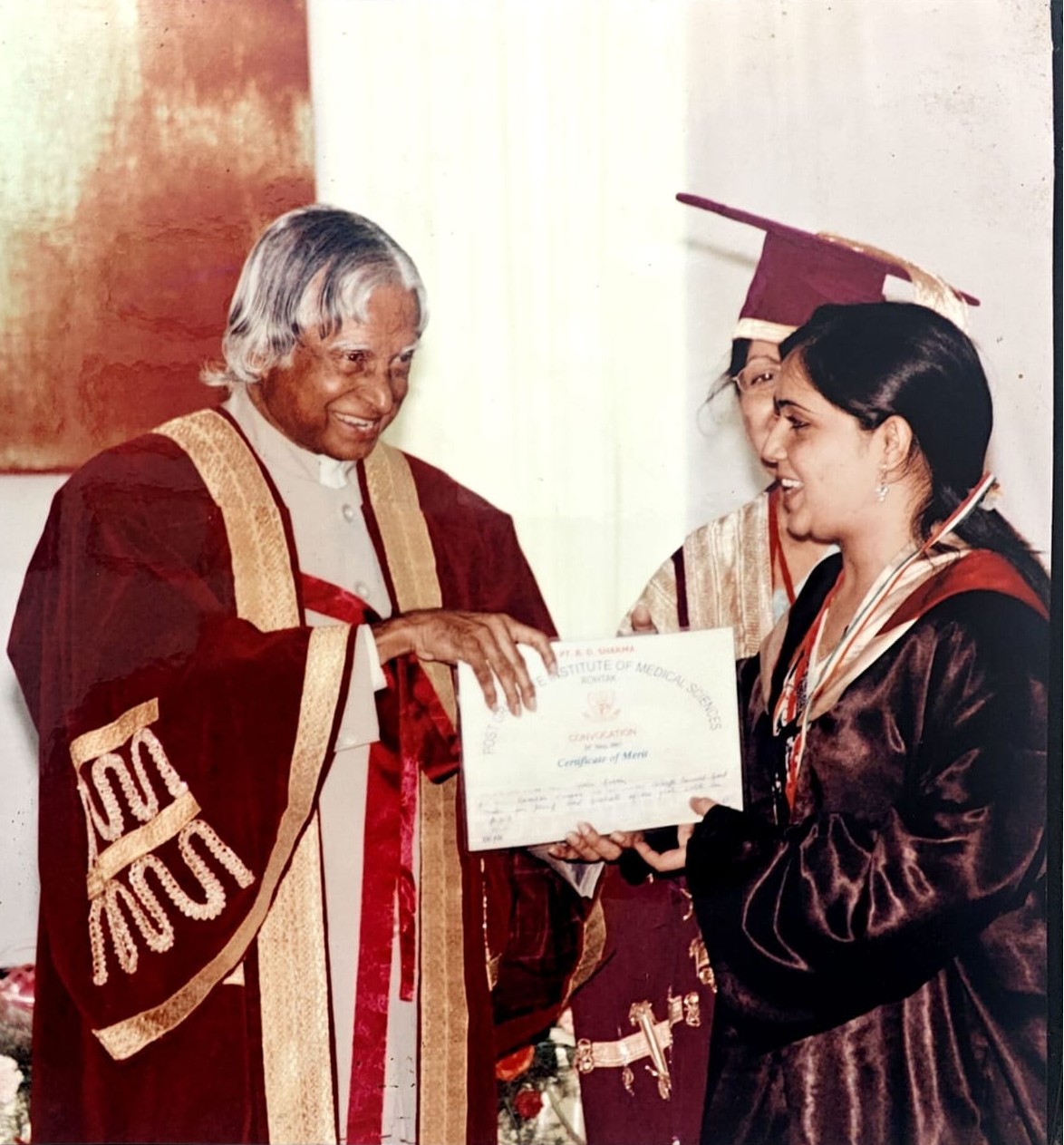 Dr Neelu receiving Gold Medal