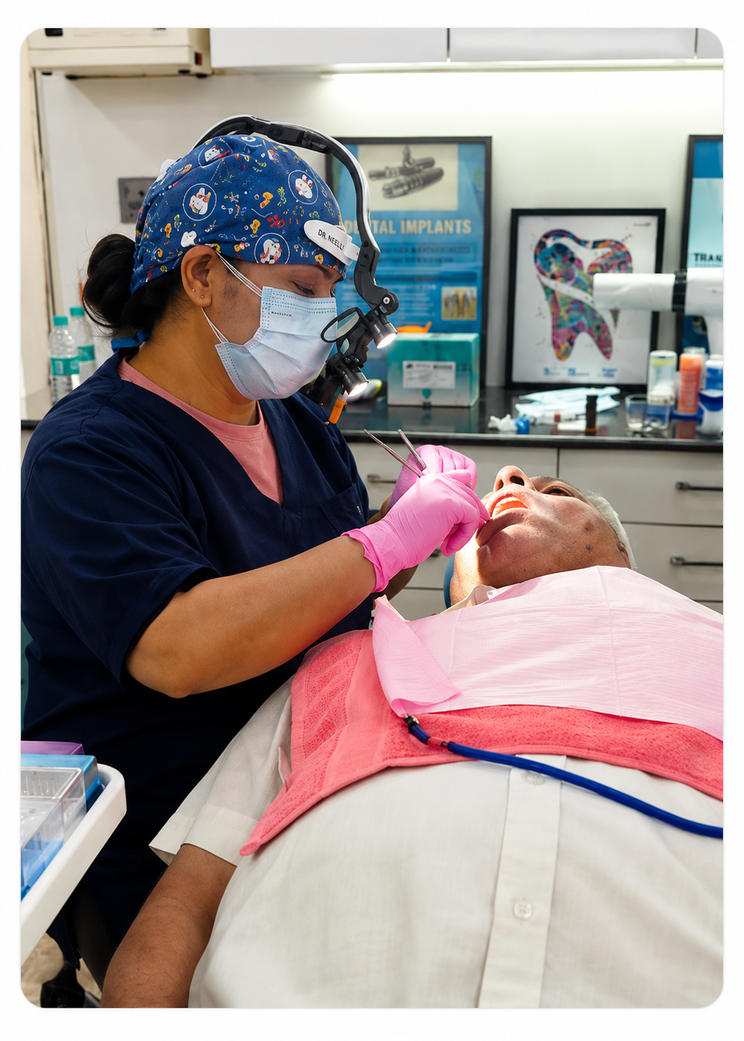 Dr Neelu Arora Gupta performing dental implant treatment